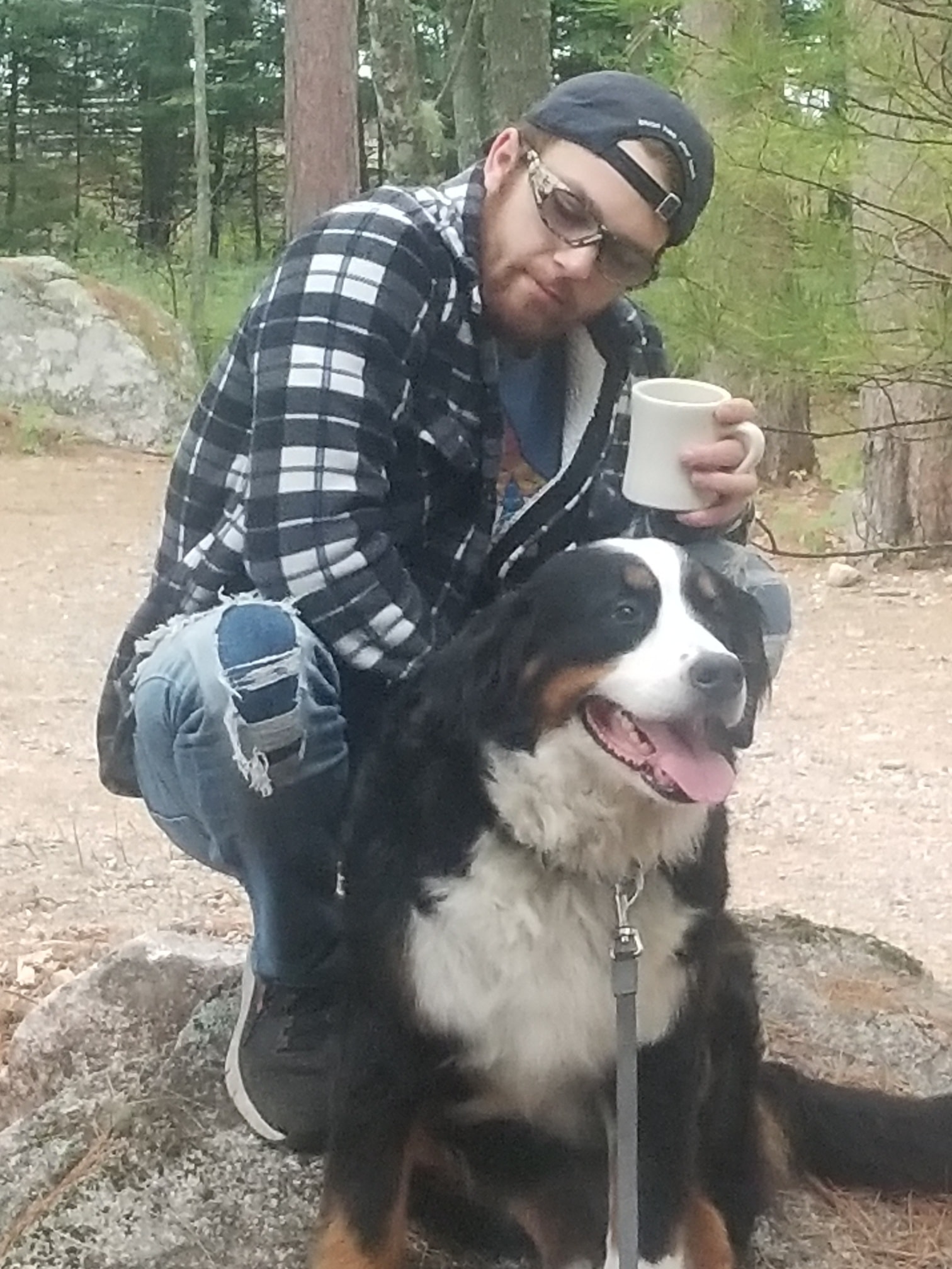 Arrow and Aaron on a forest trail